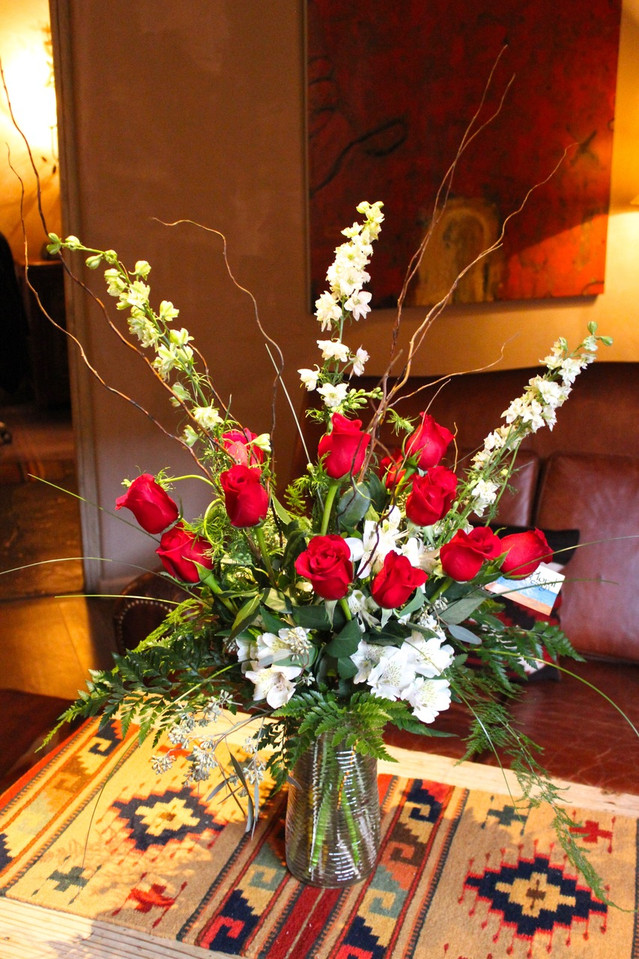 One Dozen premium long stem colored roses in a cylinder glass vase - 2+ Feet tall 